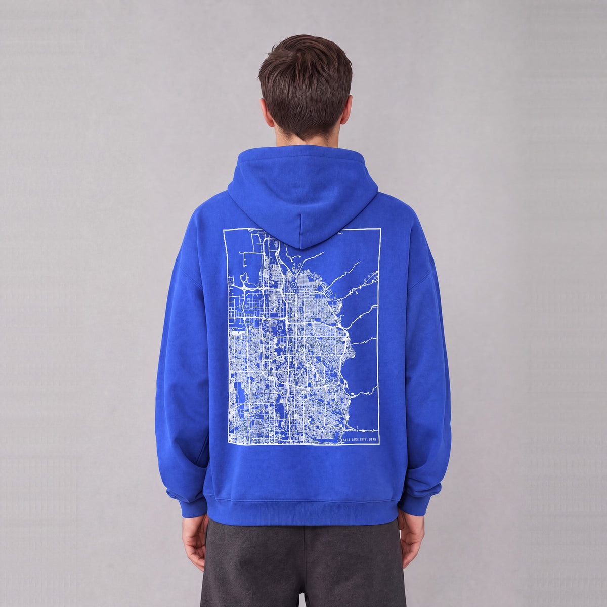 Salt Lake City map hoodie, back print on model - Royal Blue