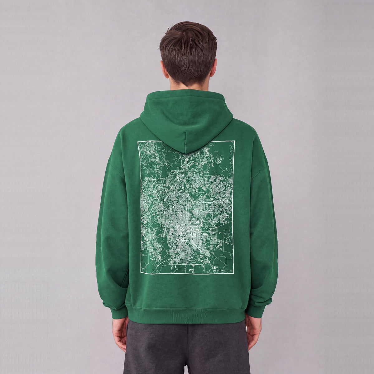 San Antonio map hoodie, back print on model - Eden Green