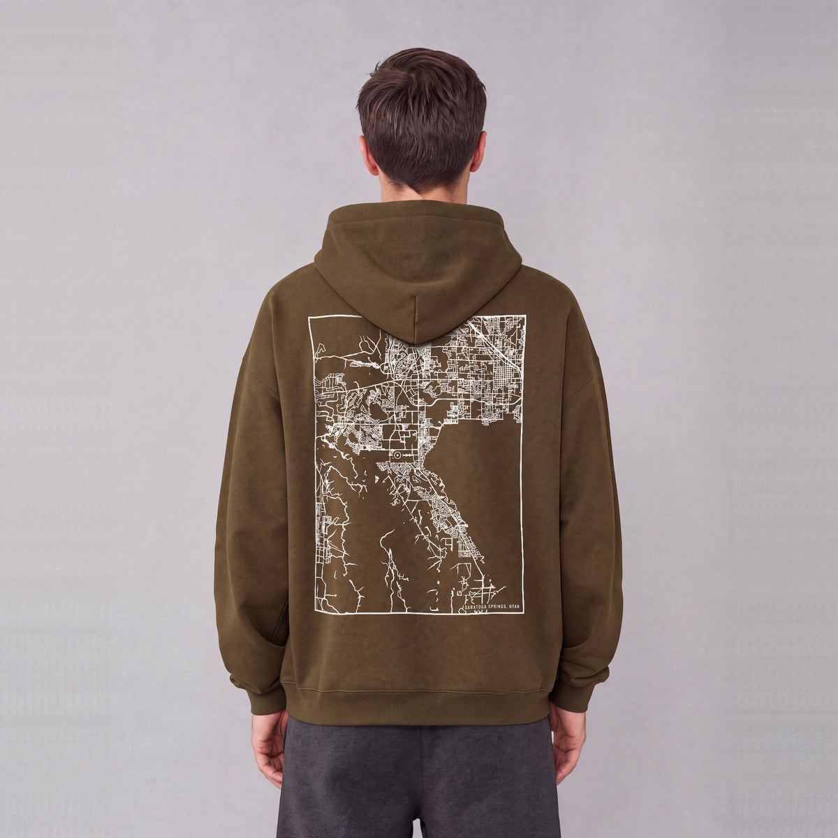 Saratoga Springs map hoodie, back print on model - Coffee