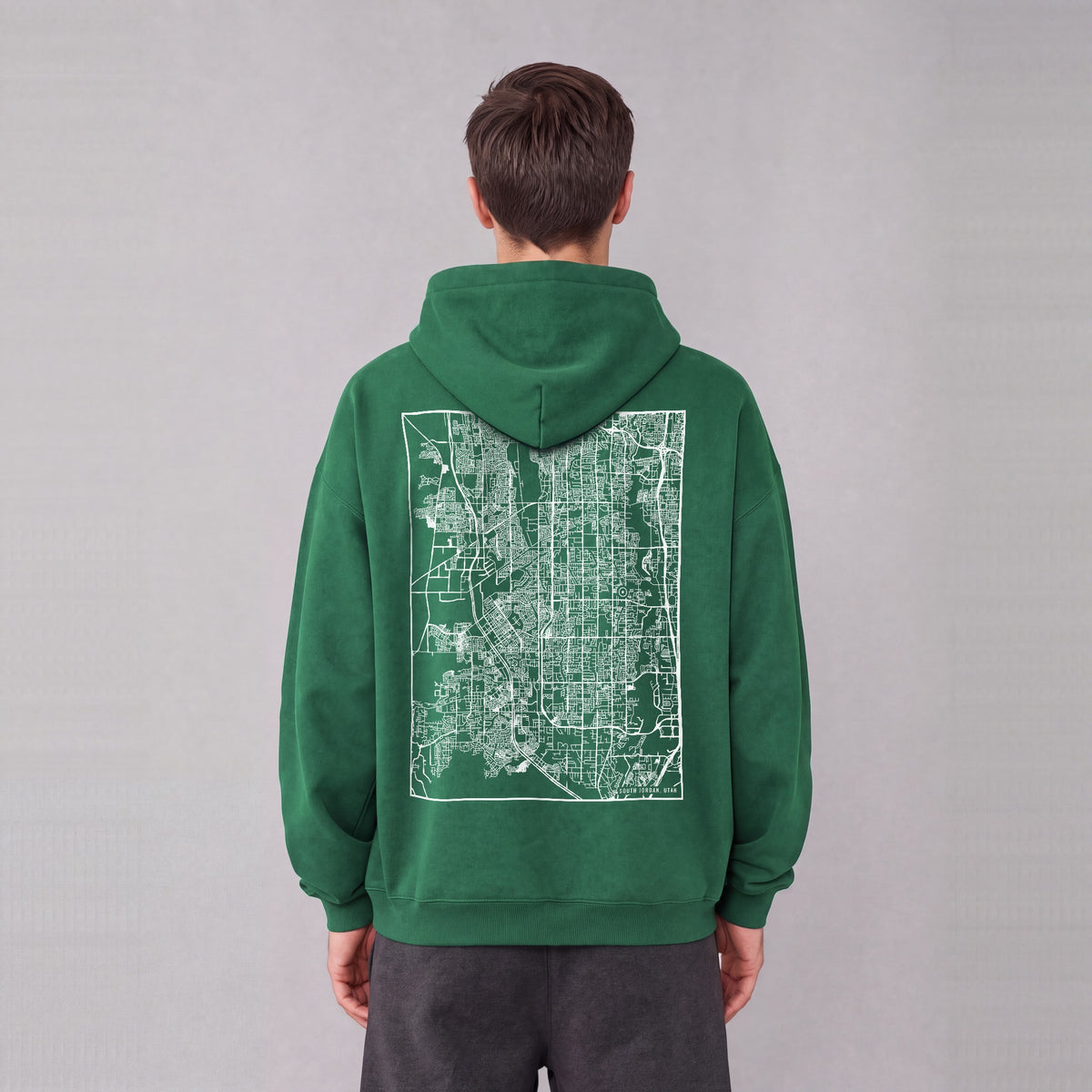 South Jordan map hoodie, back print on model - Eden Green