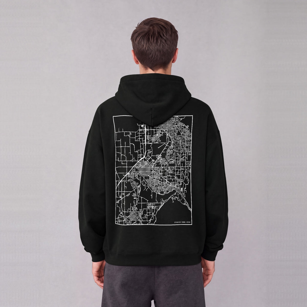 Spanish Fork map hoodie, back print on model - Black