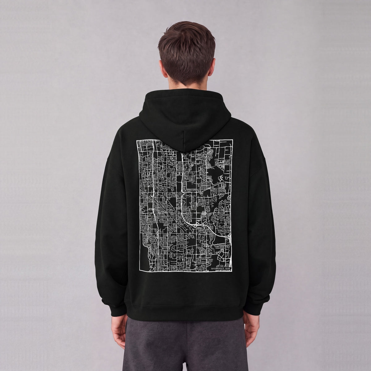 Taylorsville map hoodie, back print on model - Black