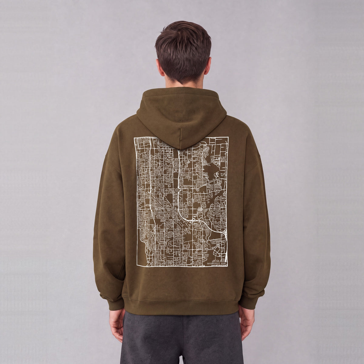 Taylorsville map hoodie, back print on model - Coffee