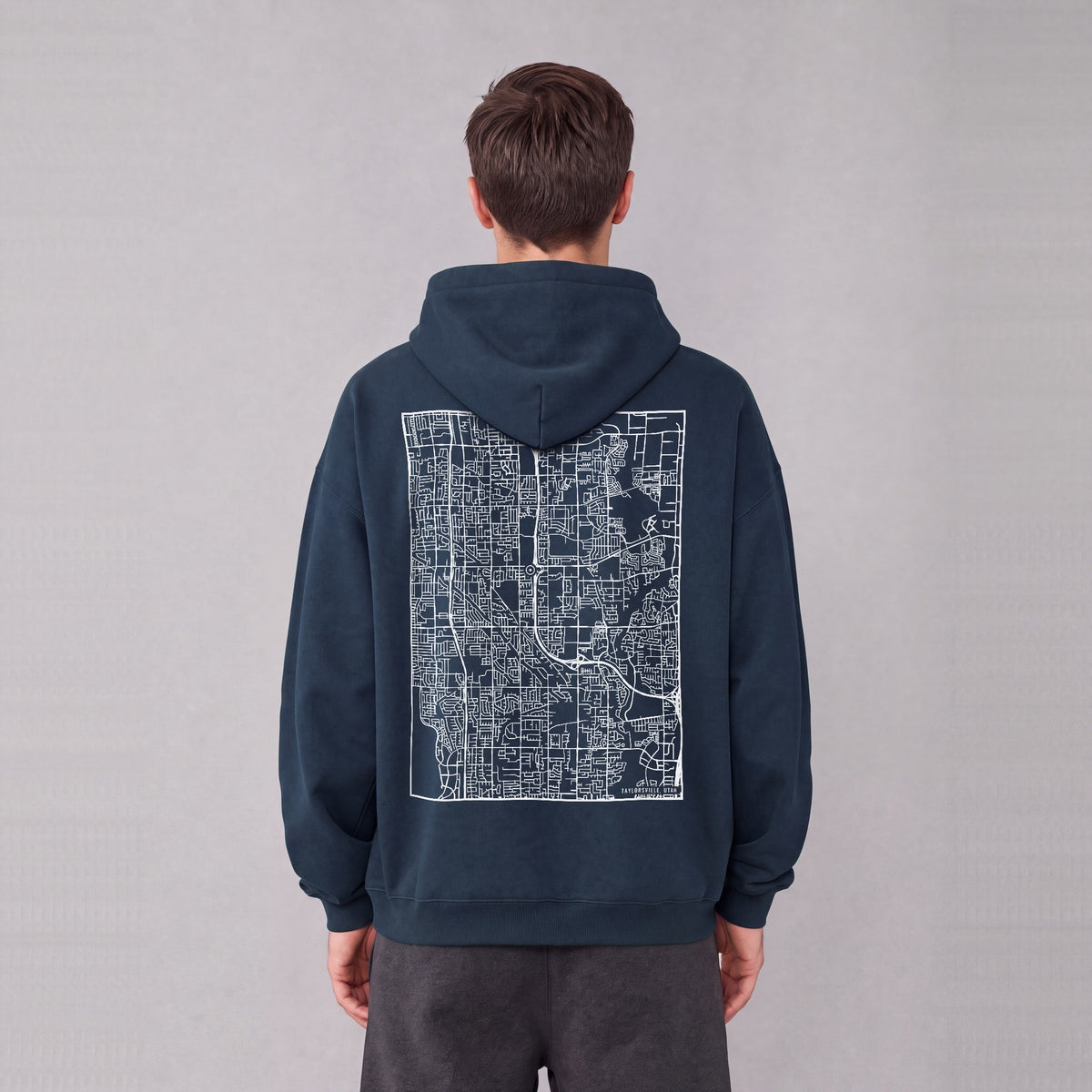 Taylorsville map hoodie, back print on model - Navy Blue