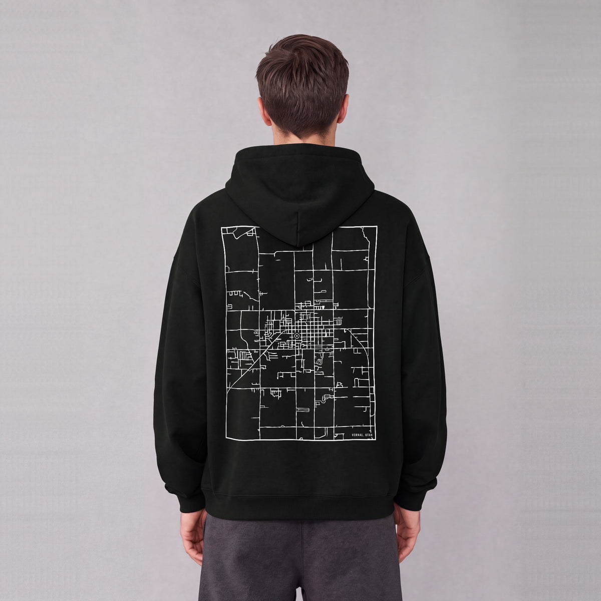 Vernal map hoodie, back print on model - Black