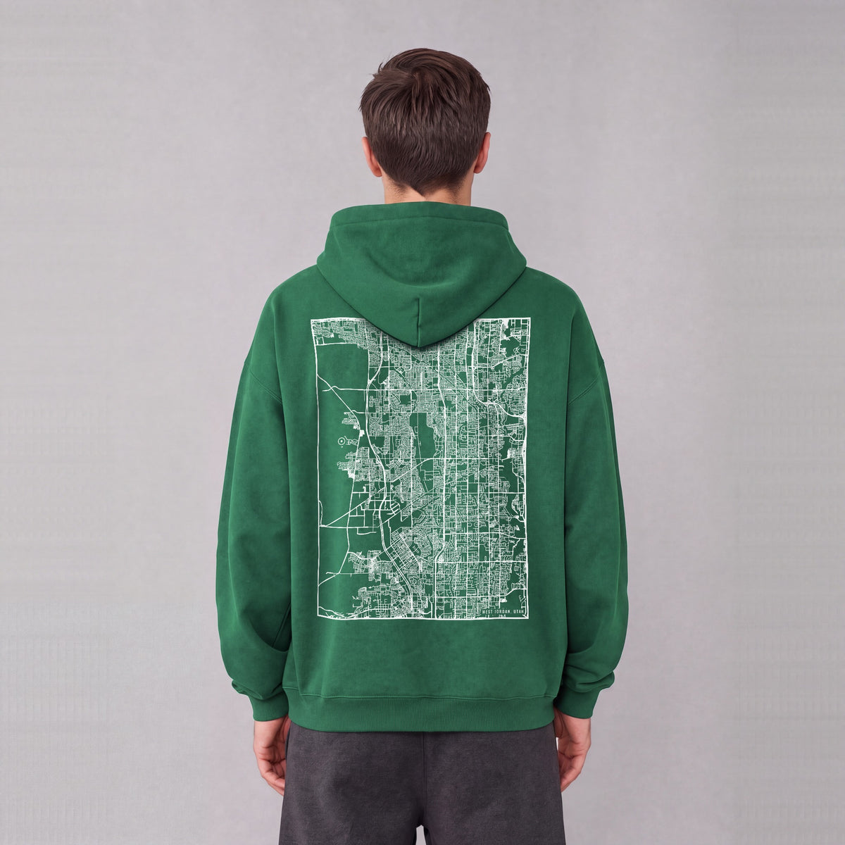 West Jordan map hoodie, back print on model - Eden Green