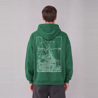 Winter Quarters map hoodie, back print on model - Eden Green